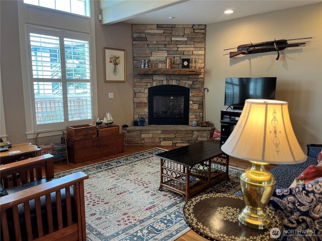 2611 Sea Crest Ave N, Long Beach, WA 98631 - living area with a stone fireplace and wood finished floors