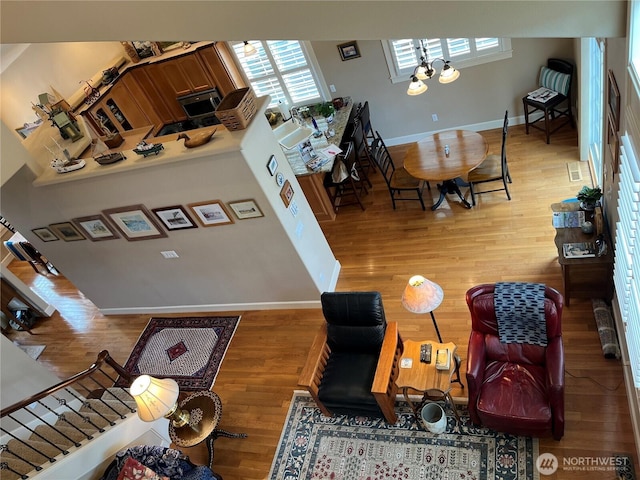 2611 Sea Crest Ave N, Long Beach, WA 98631 - living area featuring wood finished floors and a chandelier