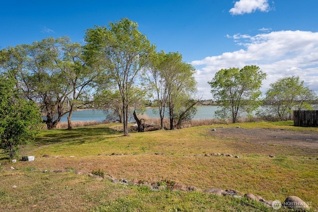 view of yard with a water view