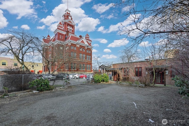 view of property featuring fence