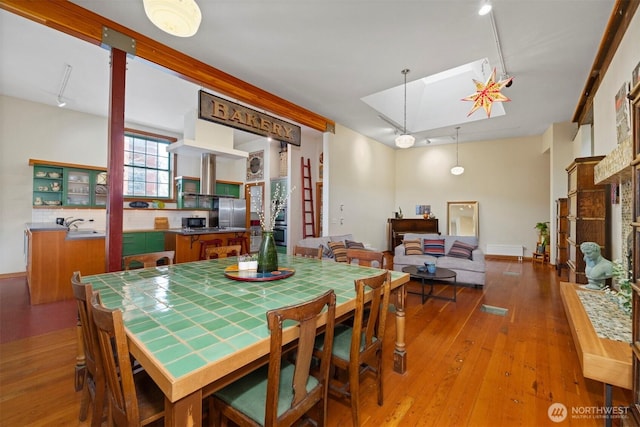 dining room with wood finished floors