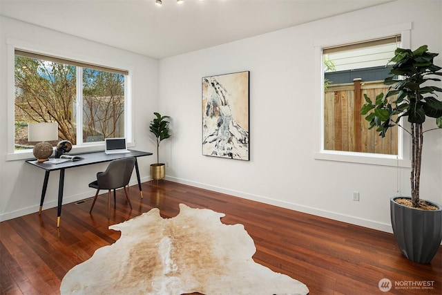 office space featuring dark hardwood / wood-style floors