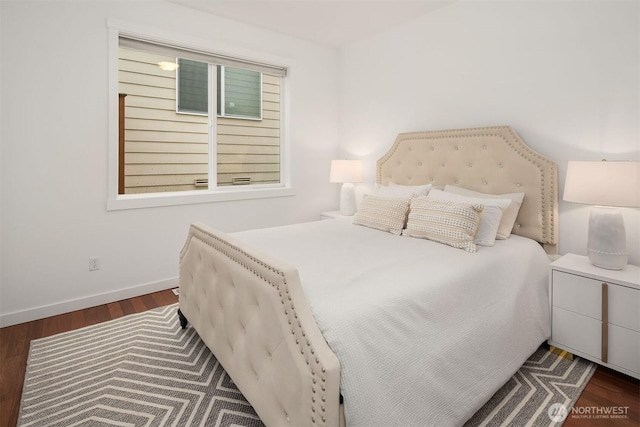 bedroom featuring dark wood-type flooring