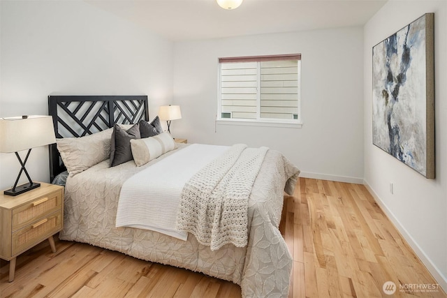 bedroom featuring light wood-type flooring