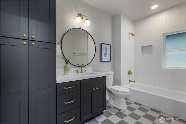 bathroom featuring shower / bath combination, tile patterned floors, toilet, and vanity