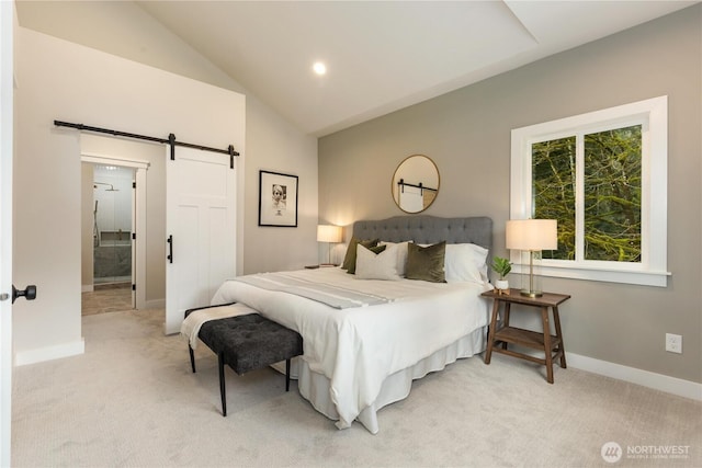 bedroom with lofted ceiling, recessed lighting, light colored carpet, a barn door, and baseboards