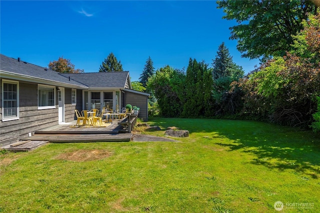 10444 16th Ave S, Seattle, WA 98168 - view of grassy yard with a deck