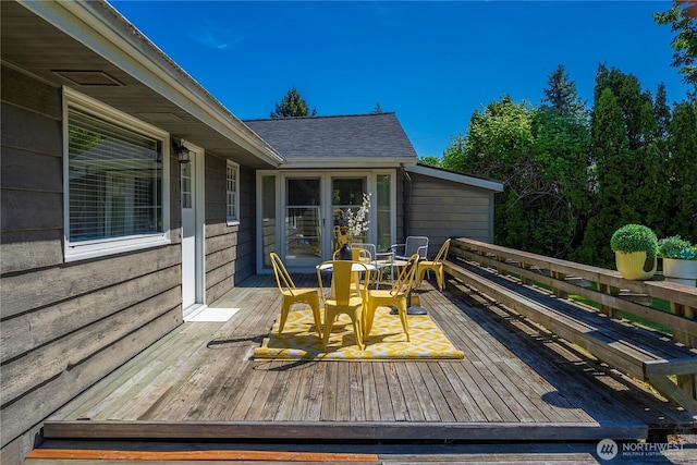 10444 16th Ave S, Seattle, WA 98168 - wooden terrace featuring outdoor dining space