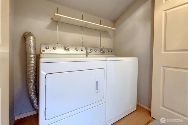 laundry room with laundry area and independent washer and dryer