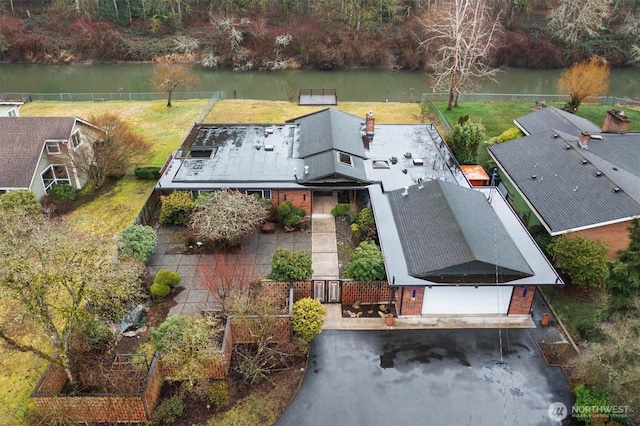 drone / aerial view featuring a water view