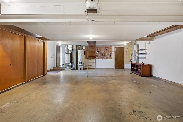 garage with baseboards, gas water heater, and a garage door opener