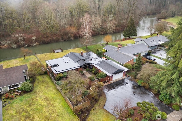 drone / aerial view featuring a water view