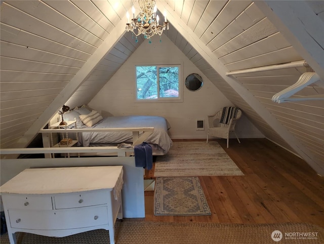 unfurnished bedroom featuring vaulted ceiling, dark wood-type flooring, a chandelier, and wood ceiling