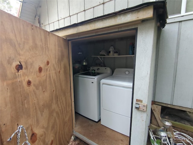 laundry room featuring washing machine and dryer