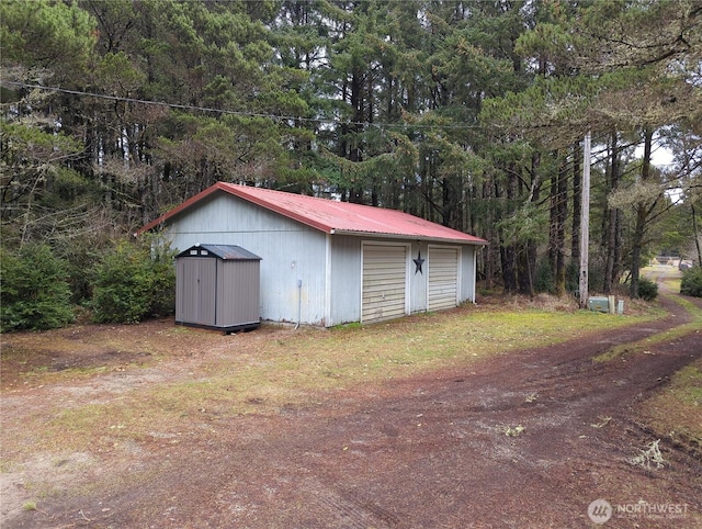 view of outdoor structure featuring a garage