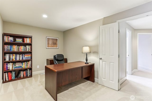 office space featuring baseboards, recessed lighting, and light colored carpet