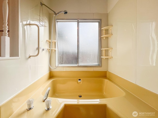 bathroom with a tub to relax in