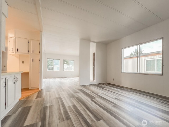 unfurnished living room with light wood-style floors