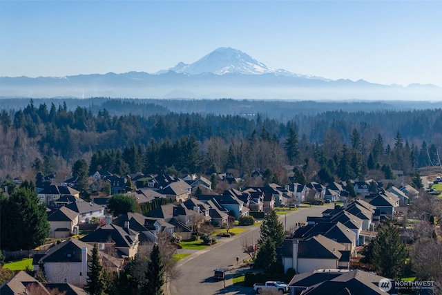 birds eye view of property featuring a residential view and a mountain view