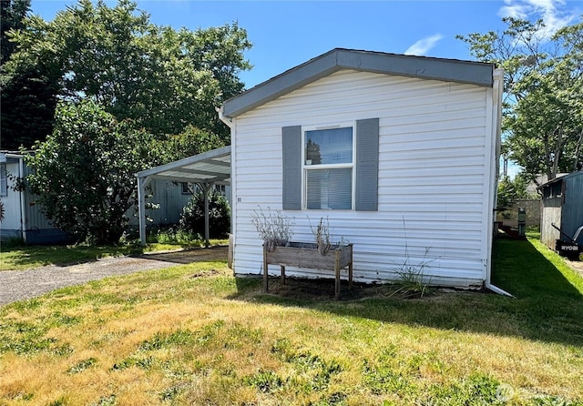 3700 X St Unit 80, Vancouver, WA 98663 - view of home's exterior featuring a yard and driveway