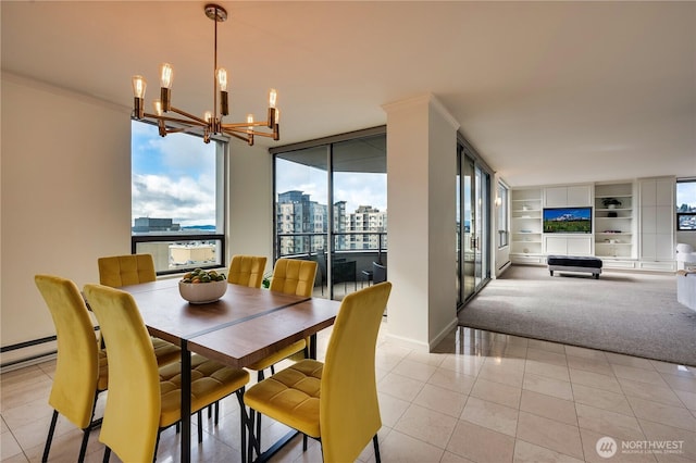 dining space featuring light tile patterned floors, ornamental molding, built in features, and an inviting chandelier