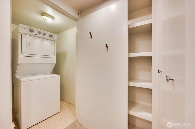 washroom with laundry area and stacked washer and clothes dryer