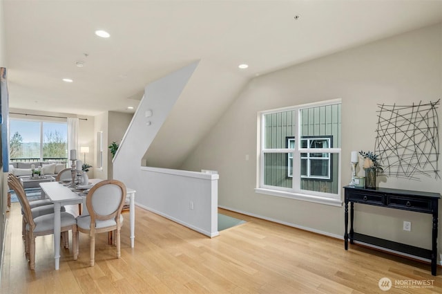 dining area with recessed lighting, light wood-style flooring, and baseboards