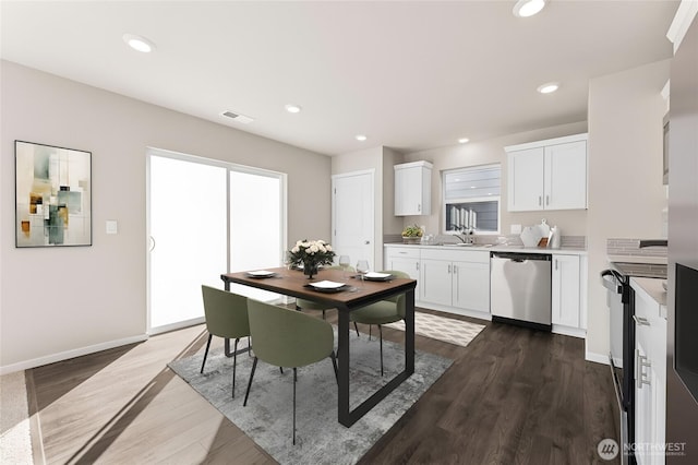 dining space featuring baseboards, dark wood finished floors, visible vents, and recessed lighting