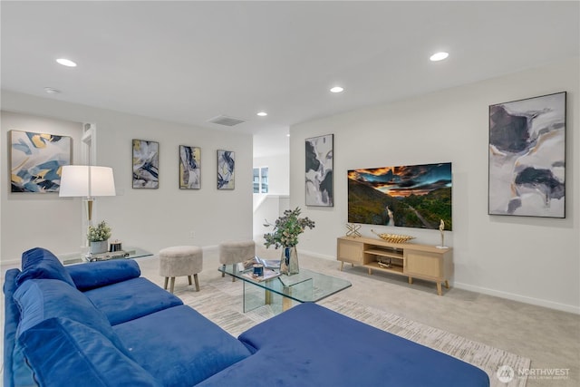 living room featuring baseboards, recessed lighting, visible vents, and light colored carpet