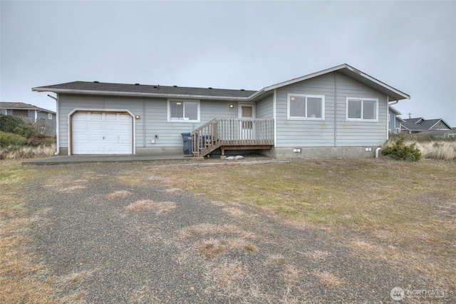 ranch-style house featuring a garage