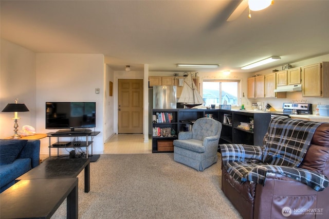 living room with light colored carpet and ceiling fan