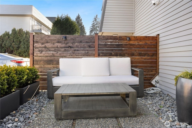 view of patio / terrace with fence and an outdoor hangout area