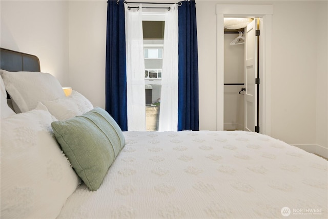 bedroom with a spacious closet