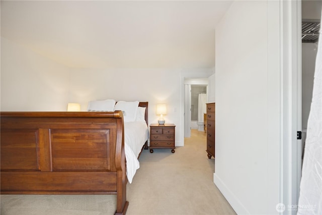 bedroom featuring light colored carpet