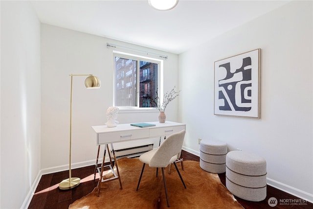 home office with baseboards and dark wood-type flooring