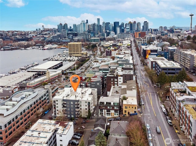 bird's eye view with a city view and a water view