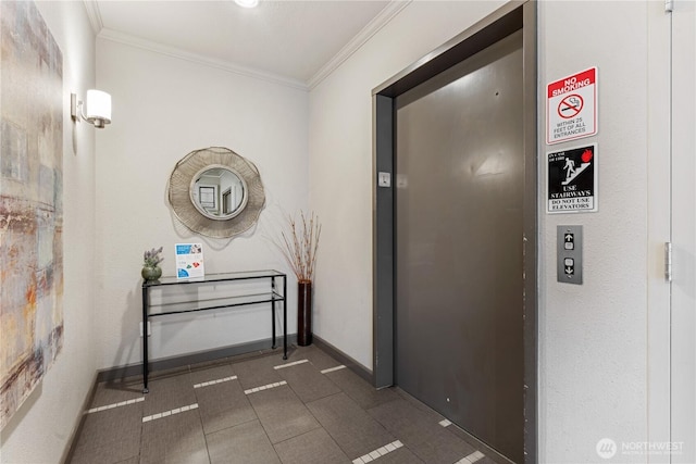 hallway with baseboards, elevator, and crown molding