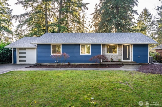 single story home featuring a garage, central air condition unit, and a front yard