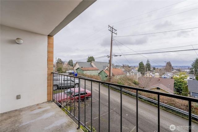 balcony featuring a residential view