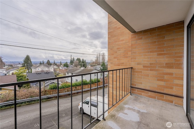 balcony featuring a residential view