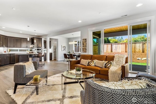 living room with light wood-type flooring