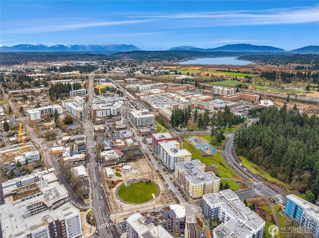 bird's eye view with a view of city and a mountain view