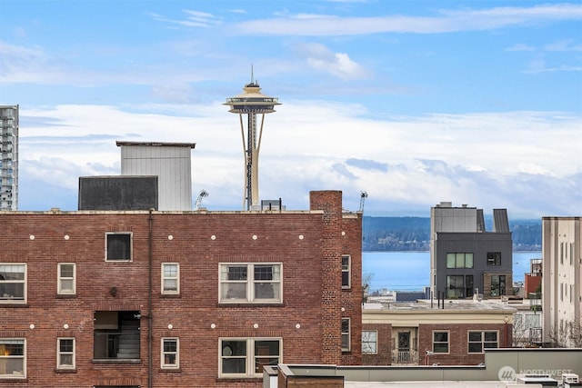 property's view of city featuring a water view