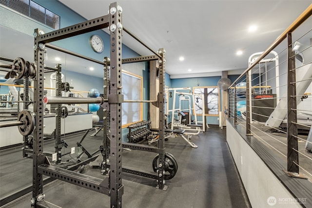 exercise room featuring recessed lighting