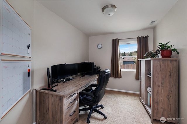 home office featuring baseboards, visible vents, and light colored carpet