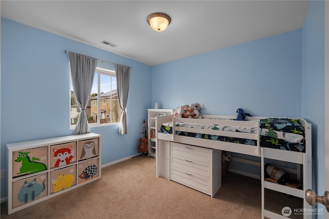 bedroom featuring light colored carpet, visible vents, and baseboards