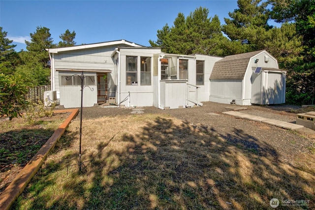 view of front of home with an outdoor structure