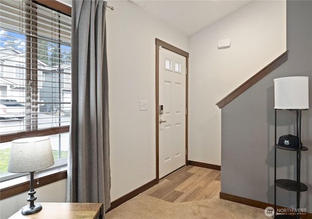 foyer entrance featuring light hardwood / wood-style flooring