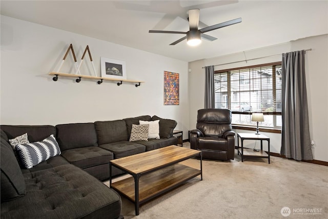 carpeted living room featuring ceiling fan