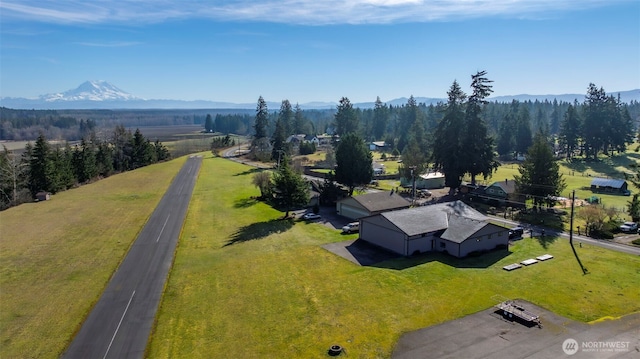 drone / aerial view featuring a mountain view